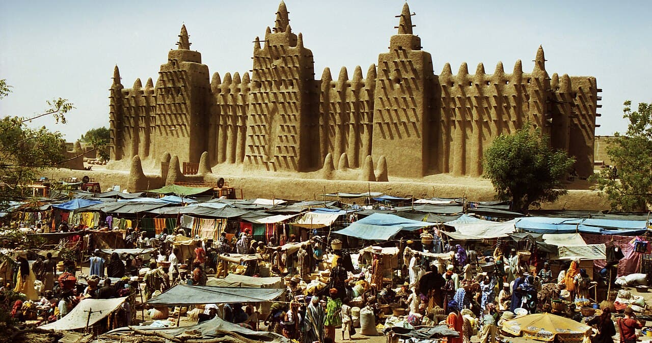 The Great Mosque of Djenné rising above a busy market
